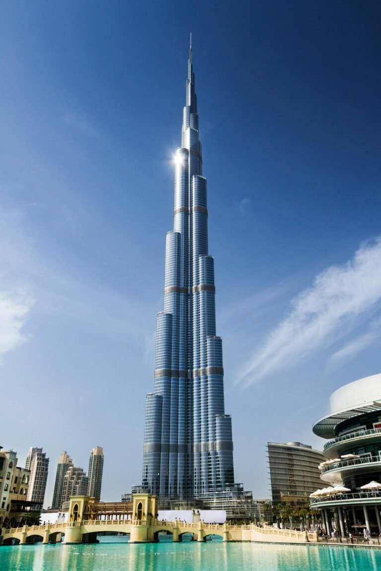 Skyline view of Dubai with Burj Khalifa, desert landscape, and luxury architecture